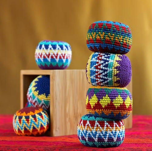 Colorful crocheted hacky sacks and crochet footbags for beginners